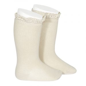 Chaussettes hautes unies avec dentelle sur bordure